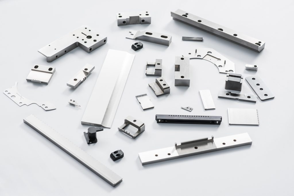 Precision die components for electronics manufacturing