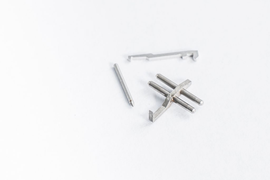Finger and load limiter parts for HDD production machinery