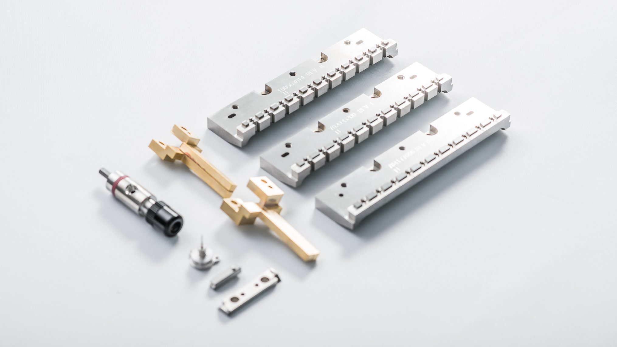 Precision cartridge components for assembly machines
